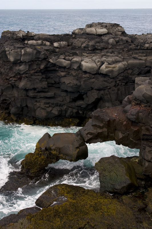 Rock Arch And Waves